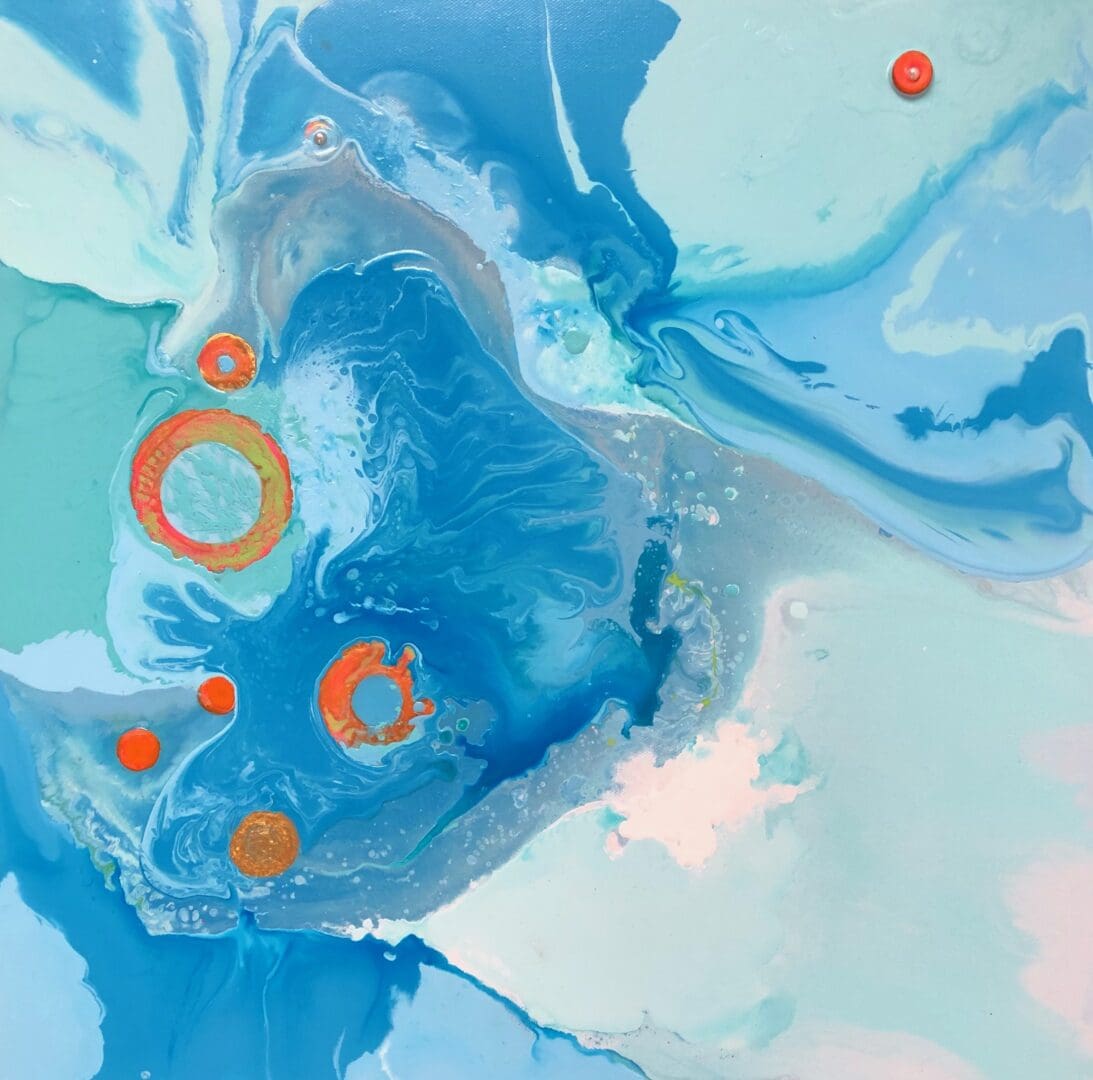 A painting with bright blue and orange colors